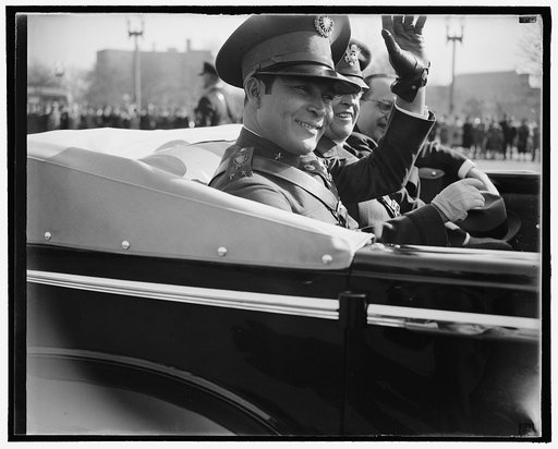 Former Cuban Army Sergeant visits Capitol. Washington, D.C., Nov. 10. Colonel Fulgencio Batista, the Cuban Army Sergeant who is now the boss of the Island of Cuba. Shown as he waved to the crowds that welcomed him to the Nations Capitol, for his first visit outside the Island in thirty seven years, 