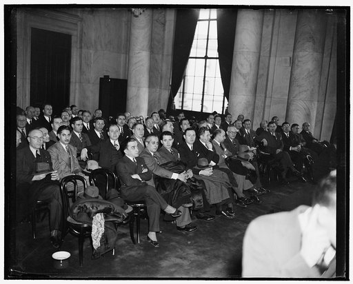 Group of Metropolitan agents at monopoly [hearing