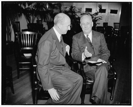 Discuss Features of New Bureau of Engraving and Printing annex. Washington, D.C., Nov. 18. Secretary of Treasury Henry Morgenthau, left, discusses with Alvin W. Hall, Director of the Bureau of Engraving and Printing, the new annex of the Bureau of Engraving and Printing which the Treasury Secretary 
