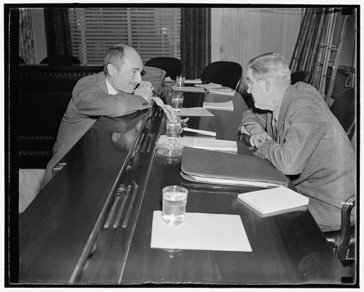 TVA Chairman and Chief Counsel confer. Washington, D.C., Nov. 30. Senator Vic Donahey, right, Chairman of the Joint Congressional Committee Investigating TVA, and Chief Counsel Francis Biddle confer during a lull at today's hearing at the Capitol