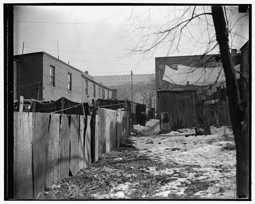 President Roosevelt approves D.C. low rent housing program. Capital slums to go. Washington, D.C., Nov. 30. President Roosevelt's approval of the $15,000,000 low rent housing program for the District of Columbia means that slum sections, such as this one showing the House Office Building in the back