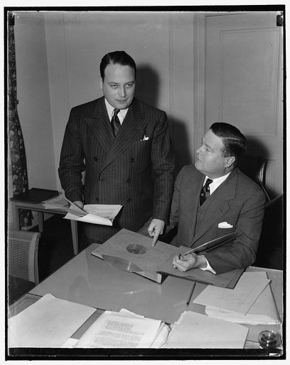 To lay charges of fraud before Secretary of Interior Ickes. Washington, D.C., Dec. 1. Turney Gratz, standing, Secretary-Manager of the Produce Dealers Division of the North Side Business and Improvement Association, Kansas City, KS[?], and Lieut. Wm. M. Boyle Jr.. Secretary to the Kansas City Police