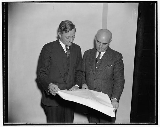 Chairman and new member of SEC. Washington, D.C., Dec. 2. Chairman William O. Douglas of the Securities and Exchange Commission, and Edward C. Ficher, former member of Congress from Iowa who recently appointed a member of the SEC by President Roosevelt