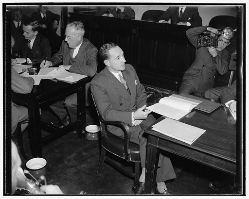 Edsal [i.e. Edsel] Ford before profit sharing committee. Washington, D.C., Dec. 6. Edsal [i.e. Edsel] Ford, President of the Ford Motor Co., made another appearance at the Capitol today - this time before the Senate Finance Subcommittee studying profit sharing systems. He told the Committee that a r