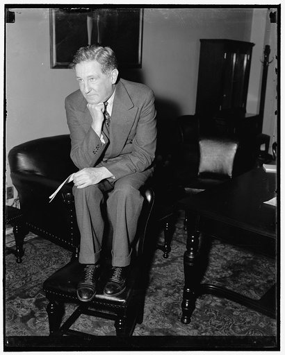 Senator-elect from California. Washington, D.C., Dec. 13. In deep study appears Senator-Elect Sheridan Downey, of California, as he surveys the Senate chamber where he will sit on January 3, 12/13/38