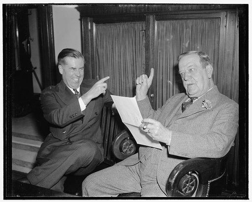 Discuss farm bill. Washington, D.C., Jan. 5. Chairman Ellison D. 'Cotton Ed' Smith of the Senate Agriculture Committee and Secretary of Agriculture Henry A. Wallace were in happy moods today as they discussed the Administration Farm to be introduced at this session of Congress, 1/5/39