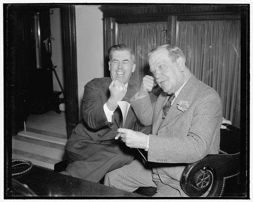 Discuss farm bill. Washington, D.C., Jan. 5. Chairman Ellison D. 'Cotton Ed' Smith of the Senate Agriculture Committee and Secretary of Agriculture Henry A. Wallace were in happy moods today as they discussed the Administration Farm to be introduced at this session of Congress, 1/5/39
