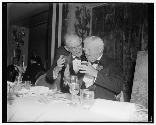 House and Senate leaders agree. Washington, D.C., Jan. 7. Speaker of the House, William Bankhead, leaned over the shoulder of Vice President Garner at the Jackson Day Dinner at the Mayflower Hotel and gestures flew. This picture is rare because Bankhead is not a gesturing man. Garner is, 1/7/39