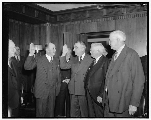 Group: John Nance Garner, 2nd from right, Jesse H. Jones, right