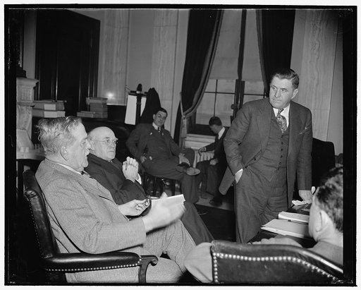 Southern farmers demand basic principles of New Deal Farm Program be retained. Washington, D.C., Jan. 9. As two southern Senators Ellison D. Smith, left, of South Carolina, Chairman of the Senate Agriculture Committee, and John H. Bankhead of Alabama, listen intently, Ranson Aldridge, President of t