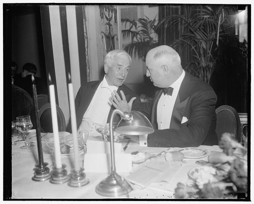 At Cummings testimonial dinner. Washington, D.C., Jan. 12. Secretary of State Cordell Hull and PMG James A. Farley pictured at last night's Testimonial Dinner to the requiring Attorney General, Homer S. Cummings, at the Mayflower Hotel, 1/12/39