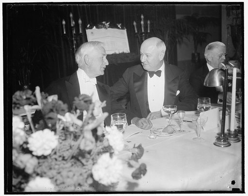 At Cummings testimonial dinner. Washington, D.C., Jan. 12. Secretary of State Cordell Hull and PMG James A. Farley pictured at last night's Testimonial Dinner to the requiring Attorney General, Homer S. Cummings, at the Mayflower Hotel, 1/12/39