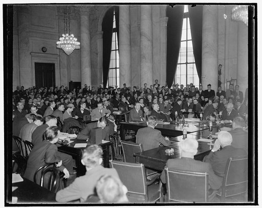 Crowd hears Frankfurter before Senate Judiciary Subcommittee. Washington, D.C., Jan. 12. The S.R.O sign was hung out today as Prof. Felix Frankfurter appeared before the Senate Judiciary Subcommittee considering his nomination to the Supreme Court. Frankfurter and his counsel, Dean Acheson, are show