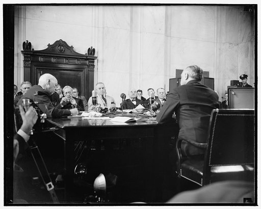 Frankfurter faces Senate committee. Washington, D.C., Jan. 12. Felix Frankfurter, right, facing the Senate Judiciary Subcommittee today to answer questions concerning his fitness for the U.S. Supreme Court. The committee later confirmed his nomination. Left to right, can be seen: Senator William H. 