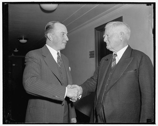 V.P. Garner congratulates Frank Hancock, new member of Home Owners Loan Bank Board
