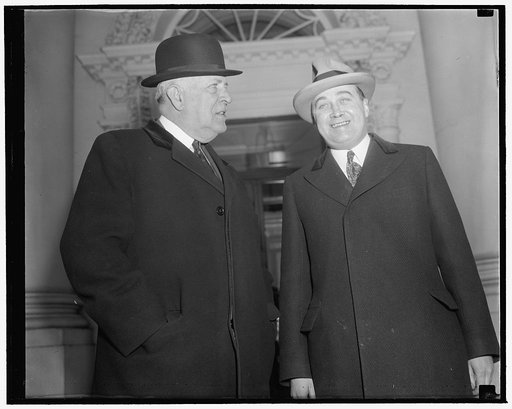 Massachusetts officials call on Roosevelt. Washington, D.C., Jan. 14. Senator David. I. Walsh and States Attorney General Paul Dever of Massachusetts today called upon President Roosevelt and are shown here as they left. It is believed that they discussed a program of solving the Back Bay State's fl