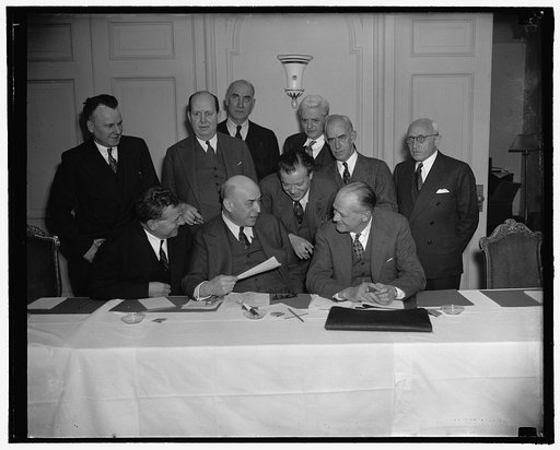 Wages [an] Hour Div. of Apparel Industry Committee met today at Raleigh Hotel to try to establish a minimum wage above the present 25 cents an hour. Lft. to rt. Joseph P. McCurdy, President of Maryland Fed. of Labor. Arthur J. Patton, retired employer. Charles Ray, retired manufacturer and former me