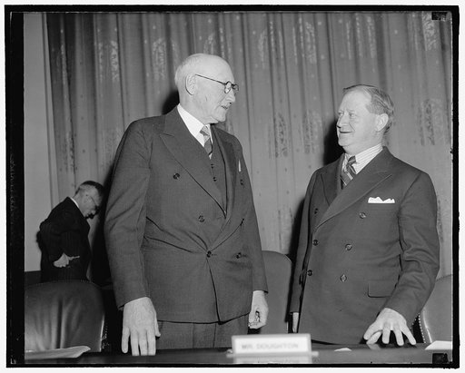 General welfare movement concludes testimony. [Washington] D.C., Feb. 7. Chairman of the House Ways and Means Committee, Robert L. Doughton, and Rep. Charles [...] Washington, talking together before today's [hearing on] old age pension plans. Leavy concluded [arguments?] for the General Welfare Fed