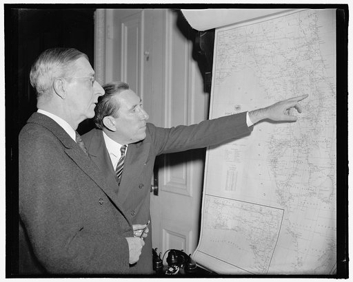 Florida ship canal again brought up. Washington, D.C., Feb. 8. One of the president's favorite projects, the Florida Ship Canal, was the subject of a meeting of the Commerce Committee of the Senate today at the request last week of the President. Senator Claude Pepper, Florida, traces the route of t