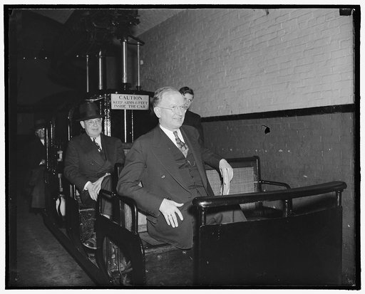 No rail troubles here. Washington, D.C., Feb. 10. Apparently no rail troubles in the Senate subway indicates Senator Burton K. Wheeler as he rides the tram car between the Senate office building and the Capitol. Senator Wheeler is Chairman of the Senate Interstate Commerce Committee which is now stu
