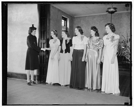 Receiving line at Immaculata Junior College. A get-acquainted tea at which students present their parents and friends to members of the faculty was given at Immaculata Junior College today. In the receiving line, left to right - Miss Estelle Flynn, the first guest to arrive, Misses Frances O'Donnell