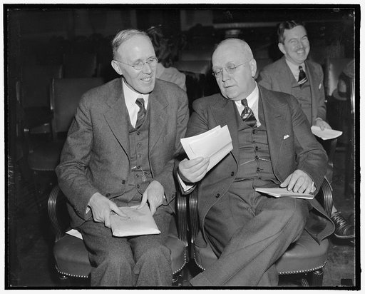 Hit Townsend pension plan. Washington, D.C., Feb. 23. Dr. Harold G. Moulton, right, President of the Brookings Institution, today told the House Ways and Means Committee that the Townsend Old Age Pension Bill 'can readily be demonstrated to be fantastic' while Dr. Willford I. King, left, of New York