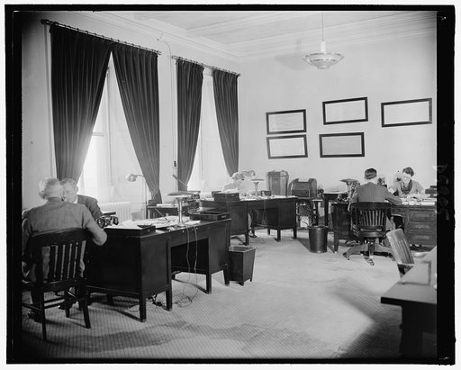 Archie Lockhead's office. He is facing camera on extreme left, 2-23-39