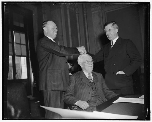 No partisanship here. Washington, D.C., March 16. Partisan politics were forgotten today when Secretary of Agriculture Henry A. Wallace appeared before the Senate Banking and Currency Committee. Wallace, who told the Committee that the U.S. must be prepared for an 'armed conflict between the currenc