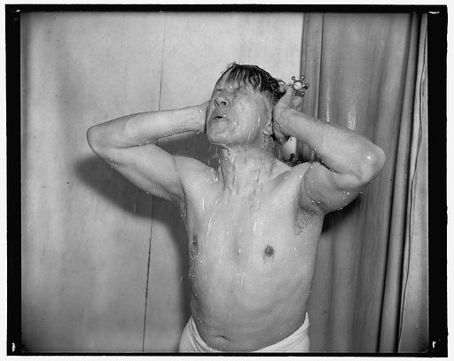 Senator Ellender. Following a round with the rowing machine and medicine ball, he finishes off with a hot shower, gradually tapering off to icy cold. 'Makes me ready to tackle the world,' 3-17-39