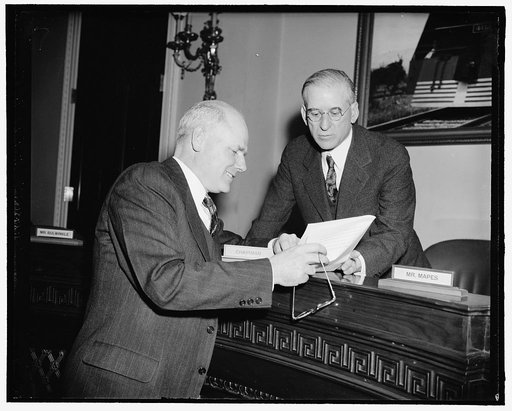 $7,300,000 sought for training civilian pilots. Washington, D.C., March 20. Robert Hinkley, left, a member of the Civil Aeronautics Authority, today declared before the House Ways and Means Committee that the aggressor nations had "Startled us into action" as he sought for the CAA an appropriation o