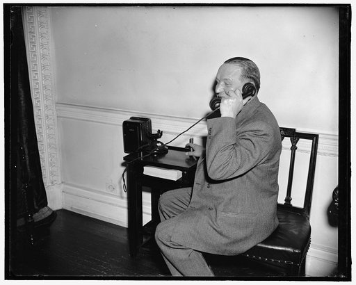 Phones boss. Washington, D.C., March 20. Kurt G. Sell, Washington Correspondent for the German News Bulletin, phones in his story of Undersecretary of State Sumner Welles' press conference today. A highlight of the conference was the announcement that American Minister Wilbur Carr had been instructe