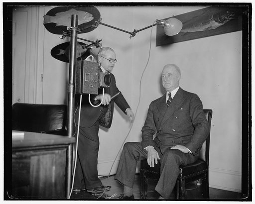 White House Secret Service Chief gets 'mugged' by F.B.I. Washington, D.C., March 21. Following President Roosevelt's suggestion at a recent press conference, White House employees from the President down were photographed and fingerprinted today by experts of the Department of Justice. Here we see C