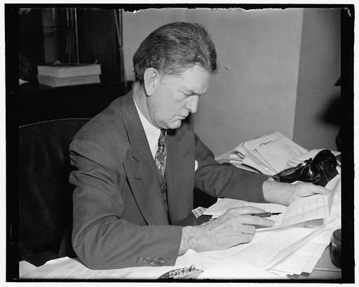Instigates Investigation of WPA. Washington, D.C., March 27. Rep. E.E. Cox, Georgia, who sponsored a resolution today to have the Appropriations Committee investigate the WPA. The House overwhelmingly approved the resolution by a vote of 352 to 27. Rep. Cox is shown here in this new informal photogr