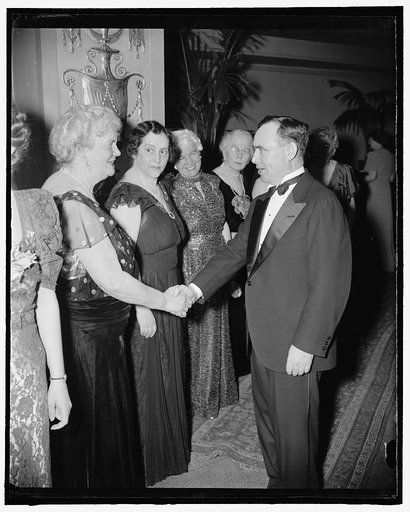 One republican greets another. Washington, D.C., March 27. Mrs. Edward Everett, Dolly Gann, sister of the late Vice President Curtis and president of the League of Republican Women of the District of Columbia, enthusiastically shook hands with Minority Leader of the House, Rep. Joe Martin of New Yor