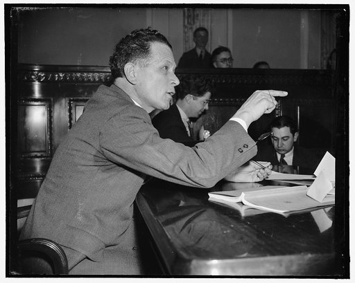 Investigating favoritism in government. Washington, D.C., March 31. A characteristic pose of Senator Allen J. Ellender, democrat of Louisiana, chairman of the Special Senate Committee investigating charges of favoritism in promotion of feminine workers on the government service. Principal charges ar
