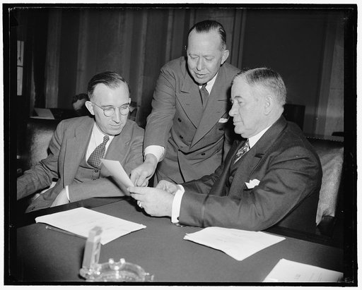 FAC Head appears before Senate committee. Washington, D.C., March 31 -F.F. Hill, left, Governor of the Senate Banking and Currency Subcommittee which is considering pending bills relating to mortgages held by agencies of the F.C.A. Hill is shown with Chairman Alben W. Barkley of the Committee, and P