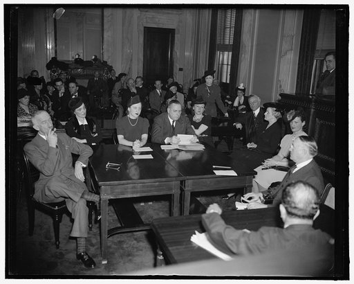 Complaints that pretty girls receive favors in promotions brings questioning of civil service employees. Washington, D.C., March 29. Senator Allen J. Ellender, Louisiana, remarked before the group of witnesses at his hearing today on civil service appointments that a group of civil service employees