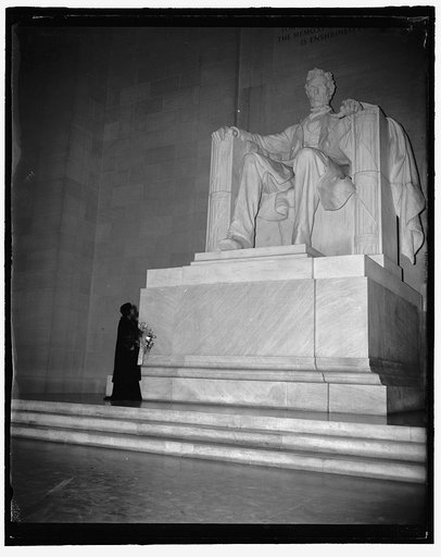Negro contralto and the great emancipator. Washington, D.C., April 9. Not since Shirley Temple visited Washington last year has anybody been photographed before the sculpture of Lincoln in the Lincoln Memorial here. Here is Marian Anderson, singer, who gave an open air concert before the Memorial th
