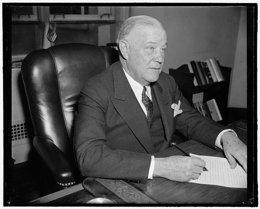 New FCC Commissioner. Washington, D.C., April 13. Frederick I. Thompson, recently named a member of the Federal Communications Commission, photographed at his desk today shortly after taking over his new duties, 4-13-39