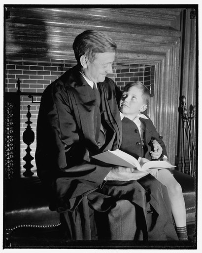 Daddy' Douglas and son. Washington, D.C., April 17. William O. Douglas, Jr., [...] that his dad looks pretty nice in his new [...] as Associate Justice of the U.S. Supreme Court. The two were photographed there today, shortly [...] Douglas was sworn in as Justice