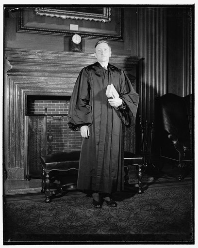Douglas dons robes of Supreme Court Justice. Washington, D.C., April 17. William Orville Douglas, 40 year old successor to retired Justice Louis D. Brandeis, today donned the robes of an associate Justice of the Supreme Court and took his place on the bench at noon today. Here he is in his new robes