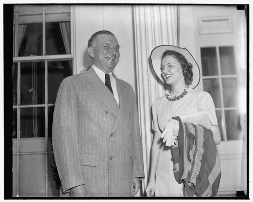 President's Secretary greets Apple Blossom Queen. Washington, D.C., April 20. Miss Genevieve Garner, granddaughter of the Vice President and Mrs. John N. Garner, who was recently named Apple Blossom Queen for the annual Winchester, Va., Apple Blossom Festival this month, was presented to President R