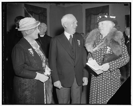 Attend American Red Cross convention. Washington, D.C., April 24. Prominent members of the American Red Cross on hand for the opening session of the annual convention of the organization today were, left to right: Mrs. Henry R. Rea, member of the Central Committee, Chairman Norman Davis, and Mrs. Au
