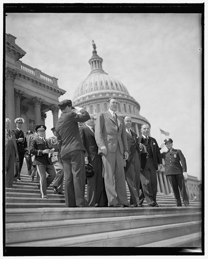 President Samoza leaves Capitol after tour. Washington, D.C., May 8. Rep. Hamilton Fish, President Anastasia Somoza of Nicaragua, and Sol Bloom, Chairman of the House Committee on Foreign Affairs, passing through lines of saluting police as they came down the house steps of the Capitol after Somoza 