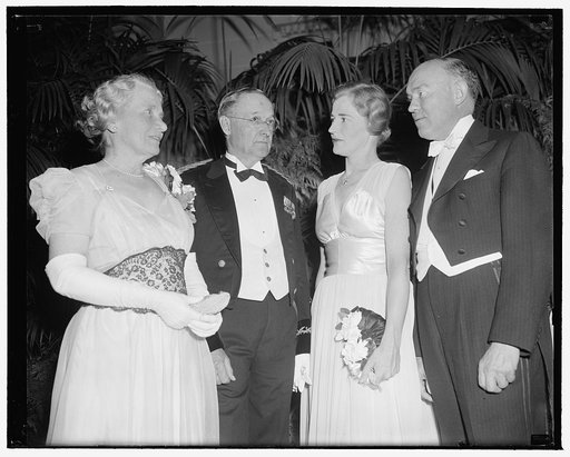 Official greeters. Washington, D.C., May 8. The official receiving line at the first official reception of the 10th International Congress of Military Medicine and Pharmacy was snapped tonight just before festivities started. Left to right: Mrs. Reynolds, Major General Charles R. Reynolds, Mrs. Harr