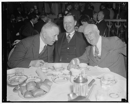 Spring luncheon meeting. Washington, D.C., May 10. Meeting of the section of International and Comparative Law American Bar Association was held here today. Caught by the camera as they came out of a huddle were, left to right: Faik Konitza, Albanian Minister, Major General A.W. Gullion, and Frederi
