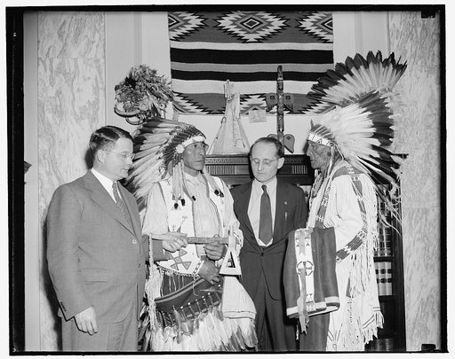 And a Tommyhawk to you, Mr. Gurney.' Washington, D.C., May 13. Representing the Rosebud Tribe of the Sioux Indians of South Dakota, Chief Joe Thin Elk and Chief Steven Brave Bird were in Washington today to describe conditions at Rosebud So. Dakota, before the Senate Committee. Enroute, they dropped