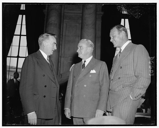 Senator Joseph C. O'Mahoney, left, co-chairman of the Monopoly Investigating Comm., & Donald Brown, Pres. of the United Aircraft Corp., & Frederick B. Rentachler, Chairman of the Board