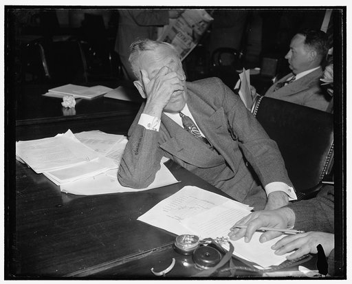 Washington, D.C., May 18, 1939. Alfred P. Sloan Jr., chairman of General Motors, before Monopoly Investigating Committee. He was questioned regarding methods used by large corporations in financing their own resources