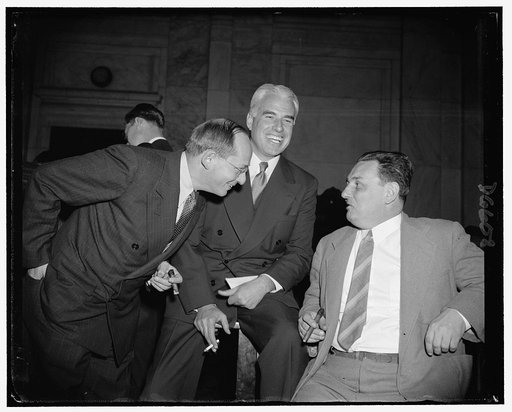 Edward R. Stettinius, Jr., Chairman of U.S. Steel. Isador Lubin, left, Commissioner of Labor Statistics. Leon Henderson, right, new S.E.C. Commissioner